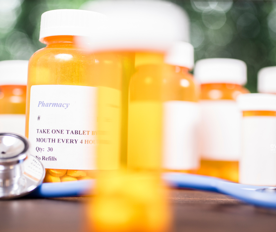 image of several pill bottles on a table to illustrate the need for understanding dilaudid and Florida's growing prescription drug problem